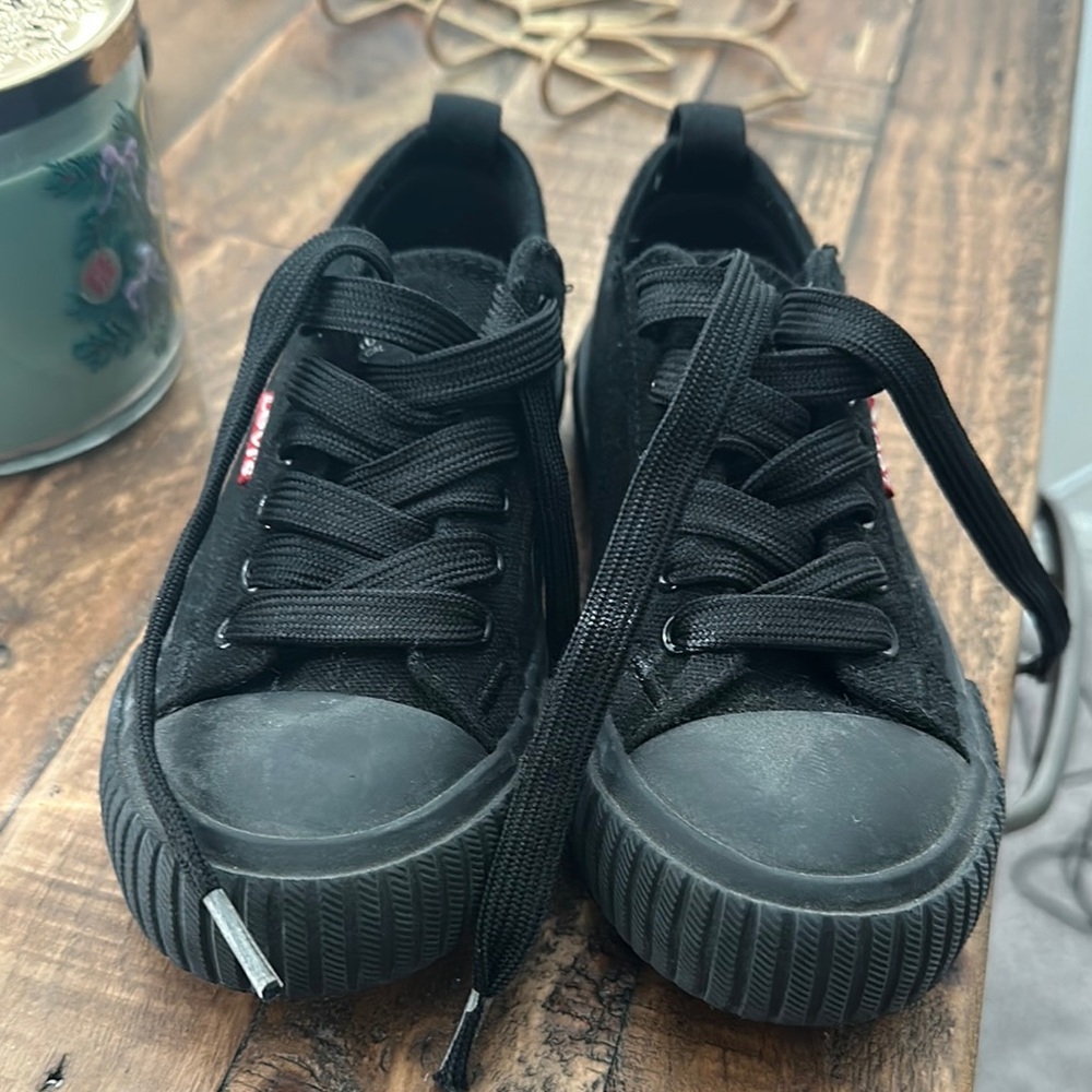 Black Canvas Sneakers worn once. Minor imperfection on one shoelace.